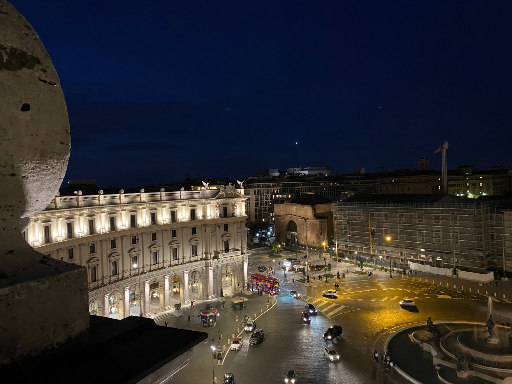 The picture of Rome at night from the rooftop of Anantara Hotel Piazza Naiadi.